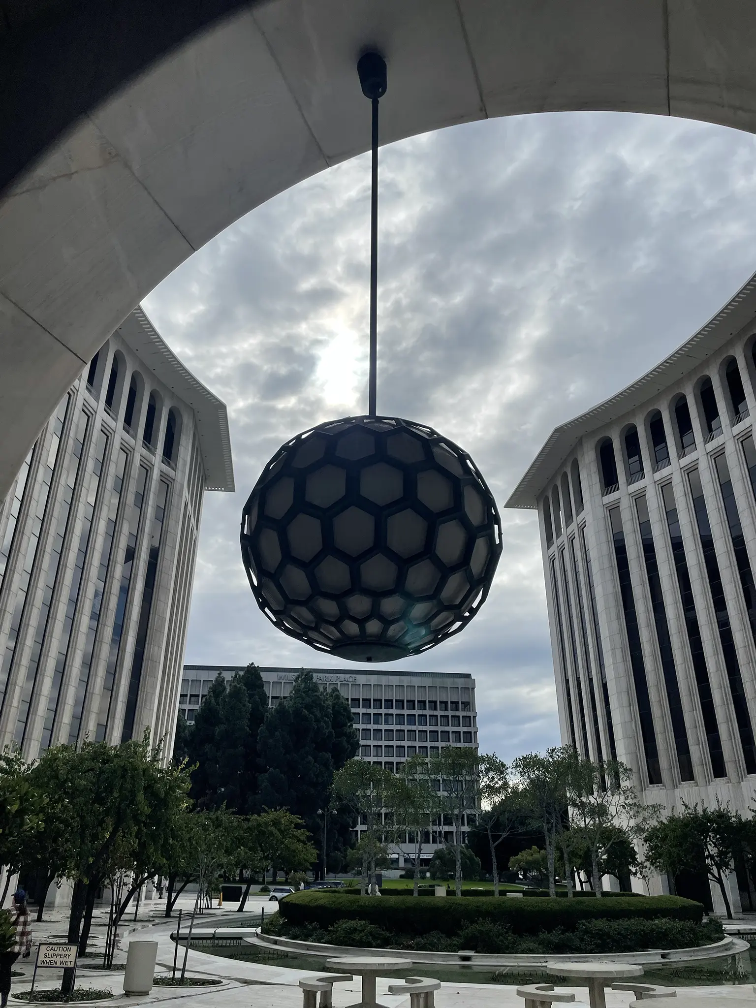 I can&rsquo;t remember if it was the 2010 GLAW or the 2013 Ciclavia down Wilshire but there was somebody that I thought was a tour guide, telling everyone facts about the Wilshire Colonnade who told us that the big gap in the middle between the buildings is because they ran out of money to build. That there was supposed to be a tall building in the middle. Nothing on the internet corroborates this story and now I wonder if this is a fiction I dreamed once. But it&rsquo;s all I see. Not from this angle. Photo by George Singletary.